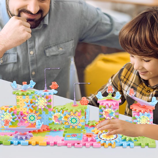 Jeux de construction à engrenages colorés enfant et papa