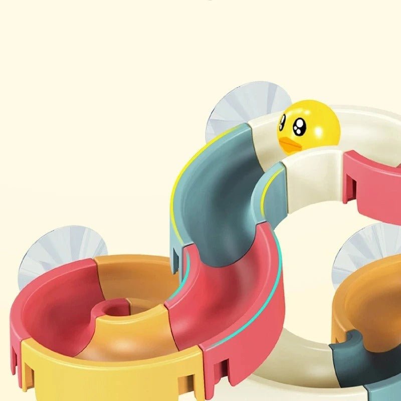 Jouets de bain toboggan aquatique - Le Cosmos Des Bambins